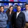 Four new oral biology faculty memebers pictured in a lab setting. 