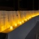 A long row of luminary lanterns. 