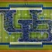 An aerial view of the field at UB Stadium as students create the interlocking UB logo on the field. 