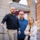 Kevin McGee (left), with UBMD, Josh Lynch (center), with JSMBS, and Amanda Martinez, a nurse practitioner with the Erie County Sheriff&rsquo;s Office, pictured in front of the Erie County Holding Center. 