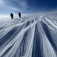 Zoom image: GreenDrill team members at Prudhoe Dome, a key ice cap part of the Greenland Ice Sheet. The project's first study shows this ice cap was gone 7,000 years ago. Photo: Jason Briner/University at Buffalo 