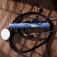A GLP-1 injector and a stethoscope on a wooden surface. 