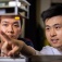 Grad students work in the lab of Wenyao Xu. 
