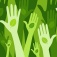 Sustainability concept featuring raised hands with a leaf icon in the center of the palms, all in shades of green. 
