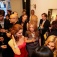 Adults at a crowded cocktail party. 