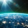 Representation of wireless communication with signals criss-crossing the globe. 