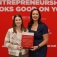 Amy Monin (left) and Hadar Borden accept an award for CoLab. 