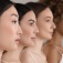Four women in profile, focus on their chins. 