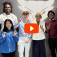 Video still of President Genco visiting with student and all making the "Horns Up' sign. 