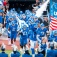 The UB Bulls run out onto the field at Broadview Stadium during a home opener game. 